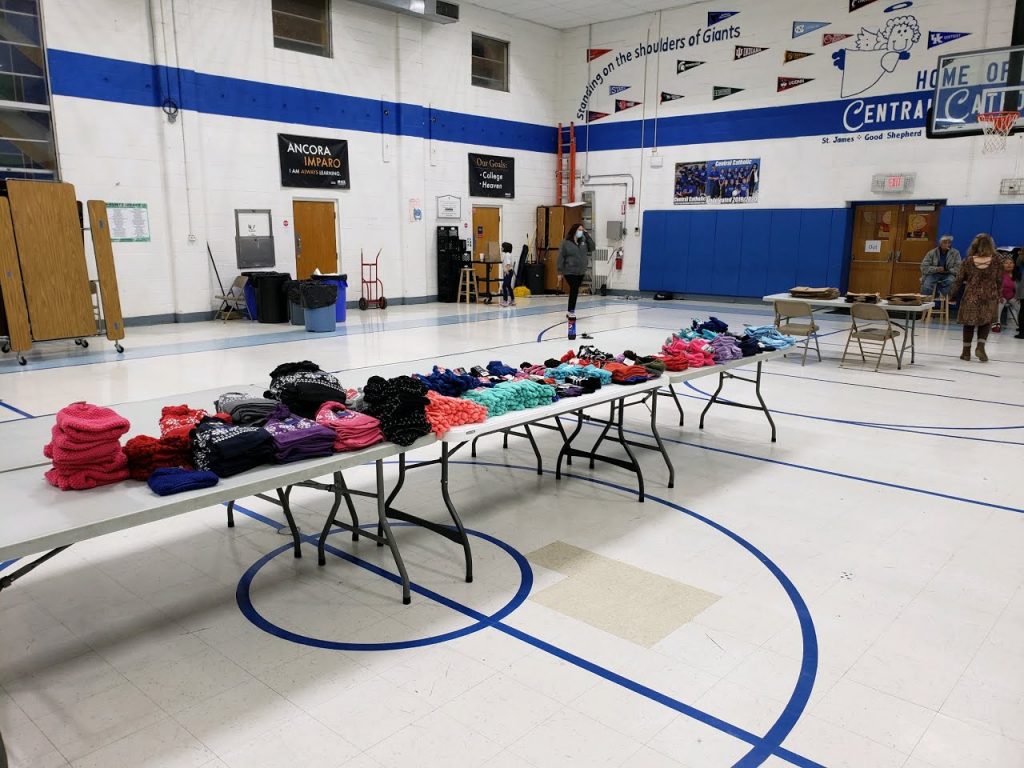 table of hats and gloves before the event started