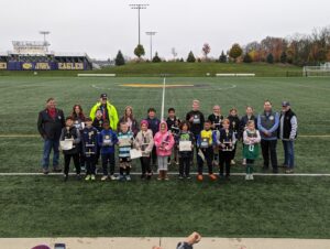 Picture of all the participating kids and the state council knights who ran the event.
